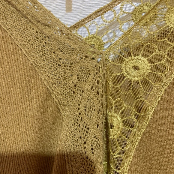 Free people shirt with awesome detailing V-neck. It is a high low size large. - Picture 9 of 10